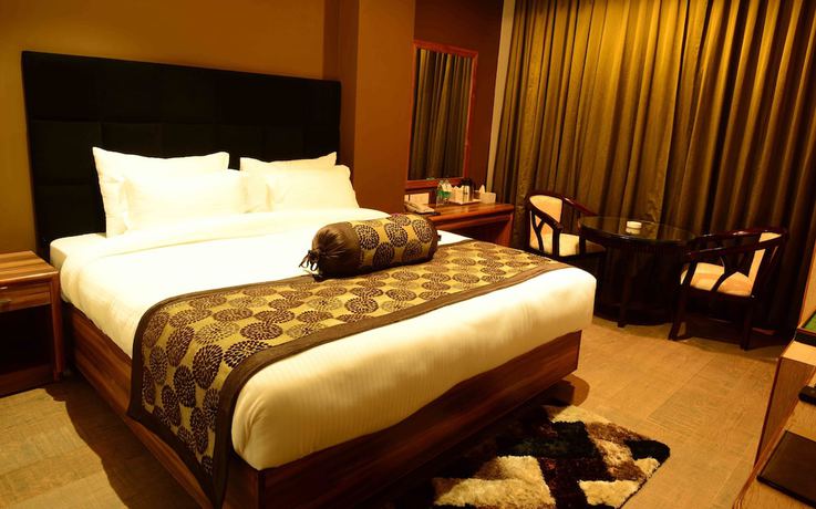 Imagen de la habitación del Hotel Shoolin Grand. Foto 14