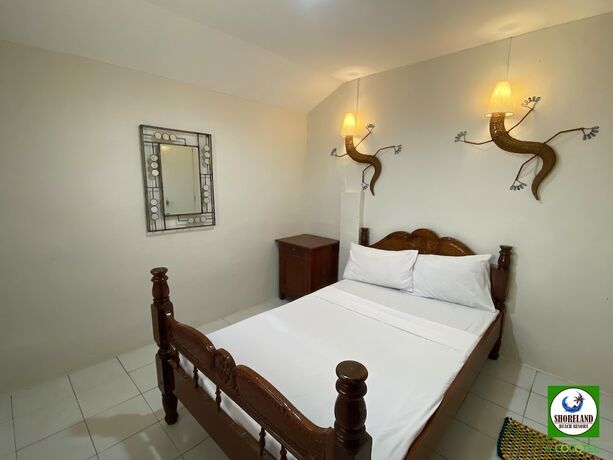Imagen de la habitación del Hotel Shoreland Beach Resort by Cocotel. Foto 13