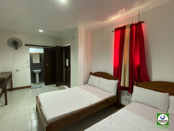 Imagen de la habitación del Hotel Shoreland Beach Resort by Cocotel. Foto 16
