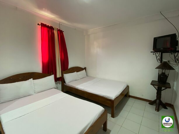Imagen de la habitación del Hotel Shoreland Beach Resort by Cocotel. Foto 19