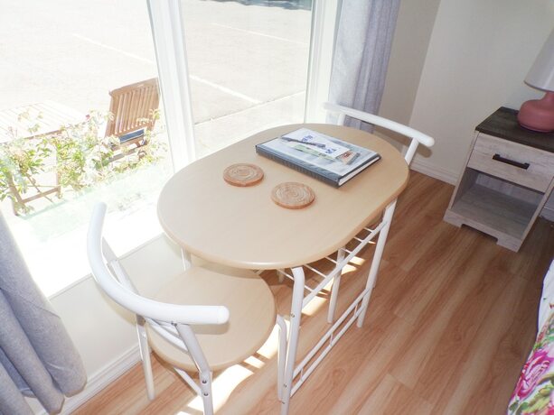 Imagen de la habitación del Hotel Shoreline Cottages. Foto 18