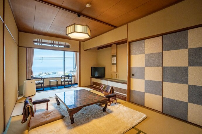 Imagen de la habitación del Hotel Shorenkan Yoshinoya. Foto 22