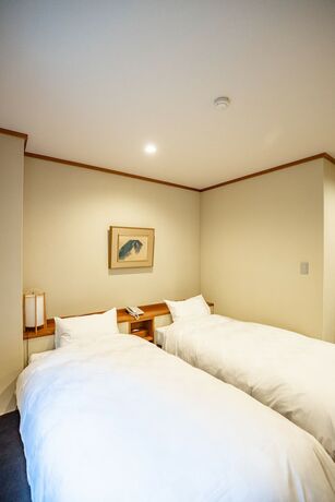 Imagen de la habitación del Hotel Shorenkan Yoshinoya. Foto 23