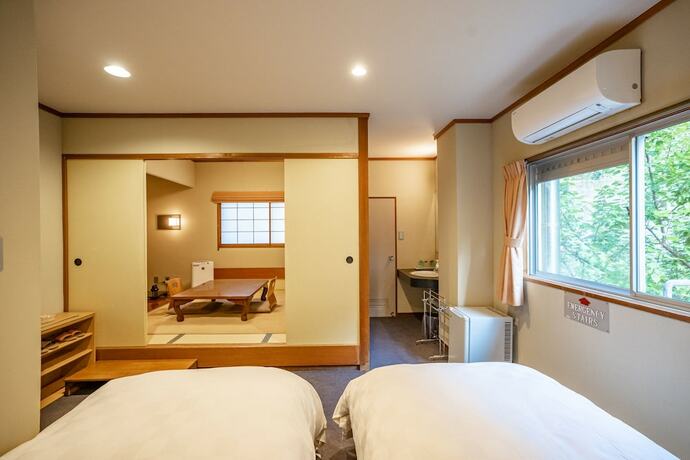 Imagen de la habitación del Hotel Shorenkan Yoshinoya. Foto 25