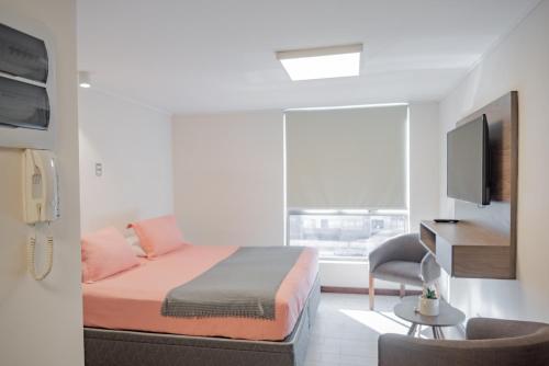 Imagen de la habitación del Hotel ShortStays Santiago. Foto 20