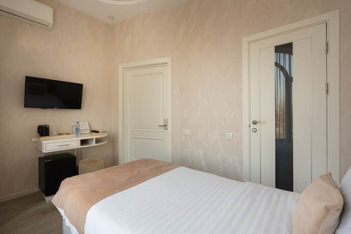 Imagen de la habitación del Hotel Shoxjahon - 600 Mbps Internet. Foto 12