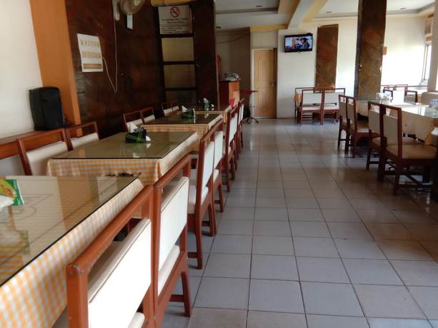 Imagen del bar/restaurante del Hotel Shraddha. Foto 3
