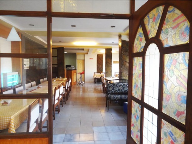 Imagen del bar/restaurante del Hotel Shraddha. Foto 4