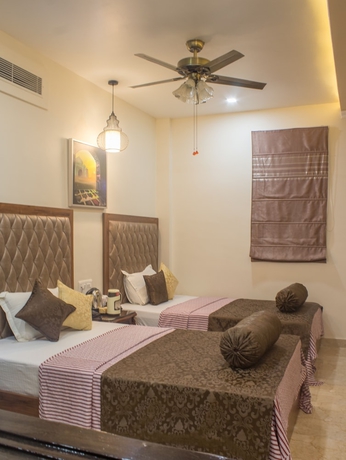 Imagen de la habitación del Hotel Shree Ganesha Residency. Foto 10
