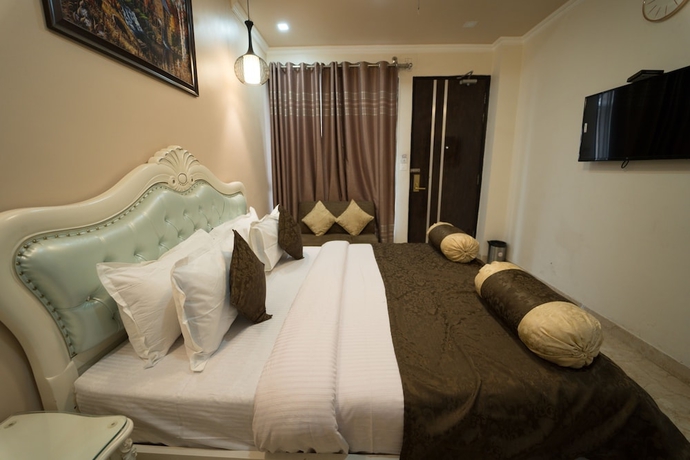 Imagen de la habitación del Hotel Shree Ganesha Residency. Foto 11