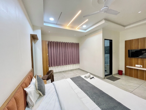 Imagen de la habitación del Hotel Shree Nakoda Paradise - Ujjain. Foto 13