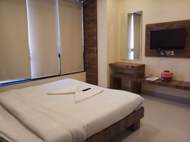 Imagen de la habitación del Hotel Shree Pratham Milan. Foto 16