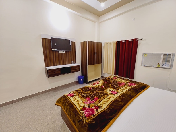 Imagen de la habitación del Hotel Shree Venkatesh Niliyam 300 M Ram Temple. Foto 5