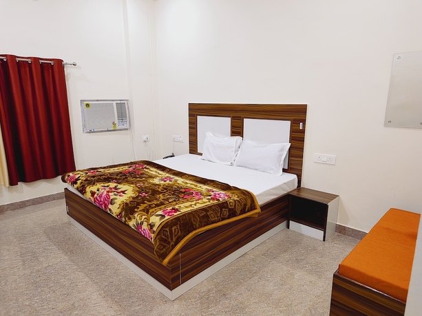 Imagen de la habitación del Hotel Shree Venkatesh Niliyam 300 M Ram Temple. Foto 7
