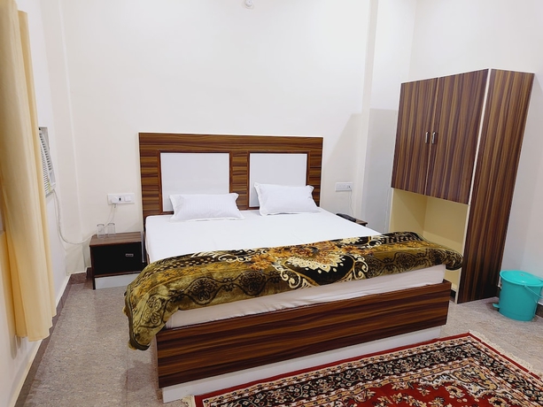 Imagen de la habitación del Hotel Shree Venkatesh Niliyam 300 M Ram Temple. Foto 9