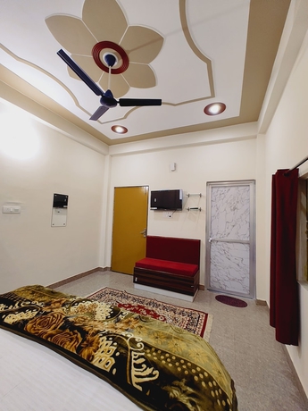 Imagen de la habitación del Hotel Shree Venkatesh Niliyam 300 M Ram Temple. Foto 10