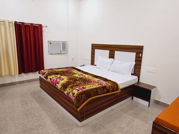 Imagen de la habitación del Hotel Shree Venkatesh Niliyam 300 M Ram Temple. Foto 11