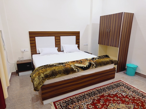 Imagen de la habitación del Hotel Shree Venkatesh Niliyam 300 M Ram Temple. Foto 12