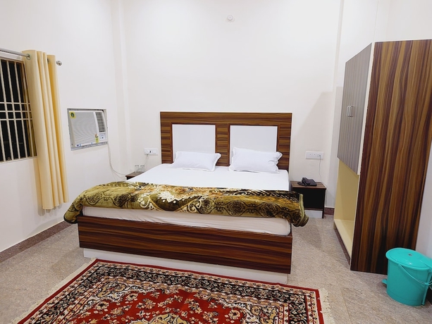 Imagen de la habitación del Hotel Shree Venkatesh Niliyam 300 M Ram Temple. Foto 13