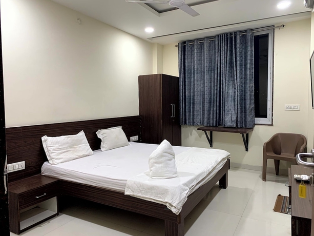 Imagen de la habitación del Hotel Shree Vrinda Homes. Foto 1