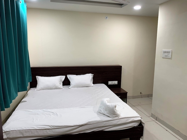Imagen de la habitación del Hotel Shree Vrinda Homes. Foto 2