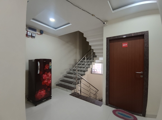 Imagen de los interiores del Hotel Shree Vrinda Homes. Foto 7