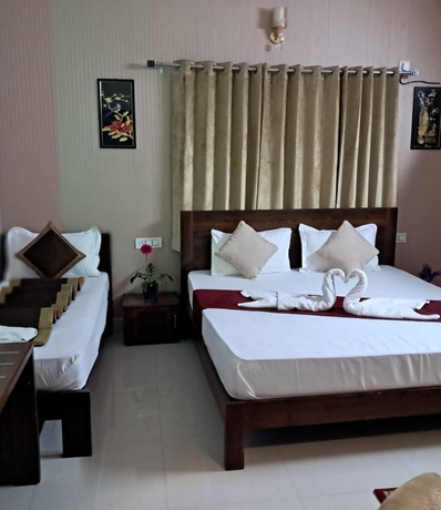 Imagen de la habitación del Hotel Shreem Homestay. Foto 11