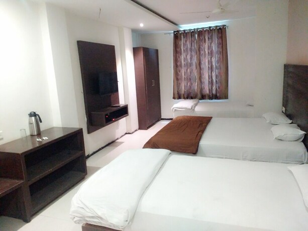 Imagen de la habitación del Hotel Shreeram. Foto 15