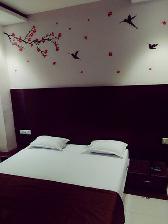 Imagen de la habitación del Hotel Shreeram. Foto 16