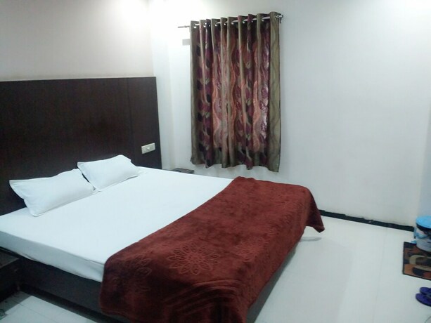 Imagen de la habitación del Hotel Shreeram. Foto 30