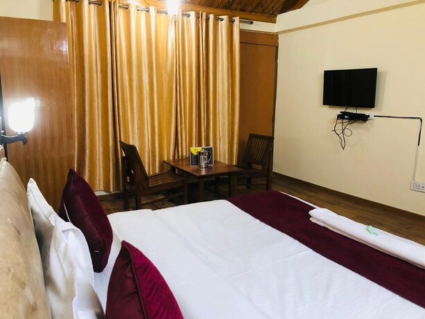 Imagen de la habitación del Hotel Shreshtam Lakhnpal Resort. Foto 15