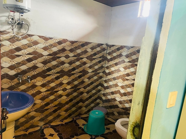 Imagen de la habitación del Hotel Shri Narayan Tourist Lodge. Foto 9