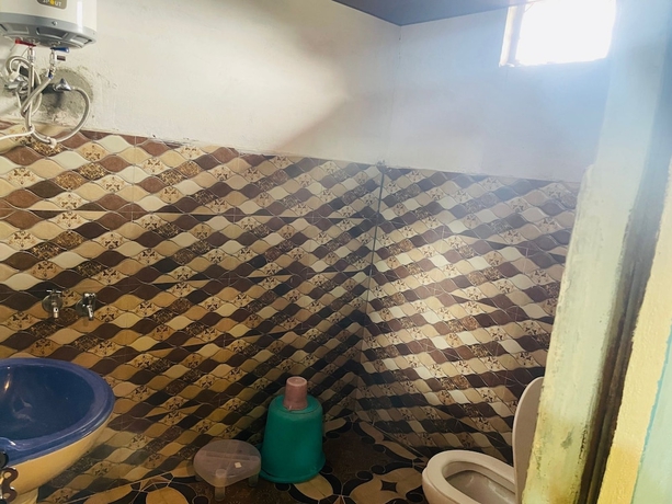 Imagen de la habitación del Hotel Shri Narayan Tourist Lodge. Foto 16