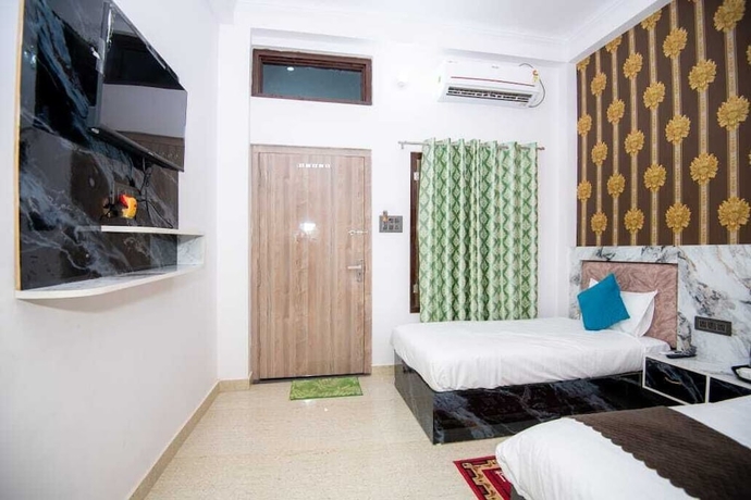 Imagen de la habitación del Hotel Shri Radhe Radhe Paying Guest House. Foto 7