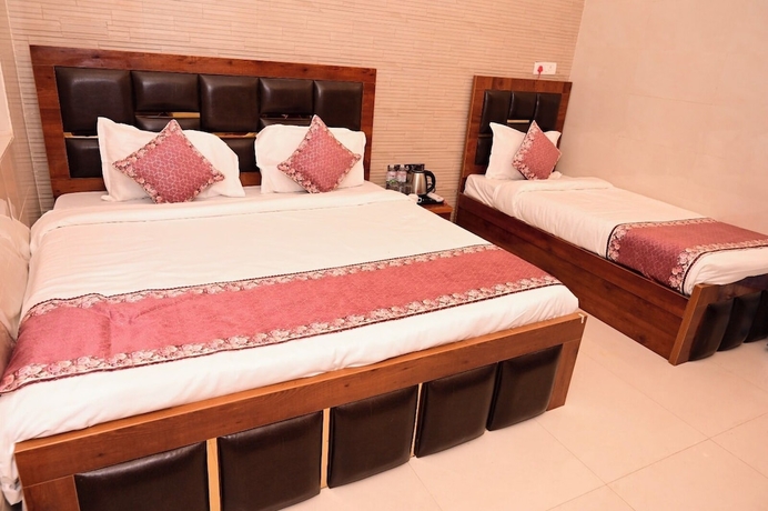 Imagen de la habitación del Hotel Shri Ram Lalla International. Foto 1