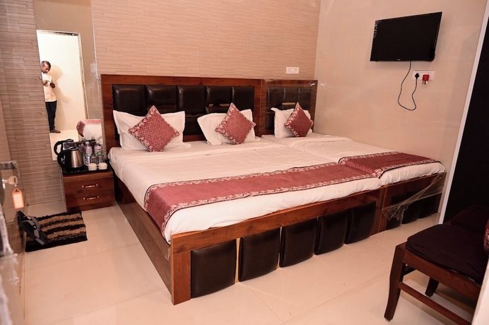 Imagen de la habitación del Hotel Shri Ram Lalla International. Foto 11