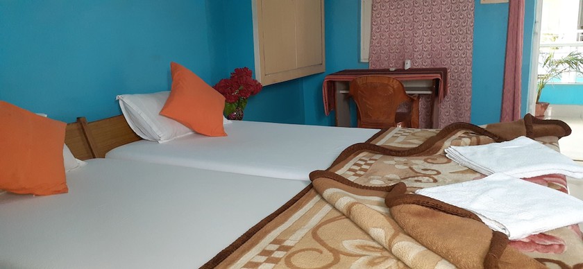 Imagen de la habitación del Hotel Shri Yoga Mandir Guest House. Foto 4