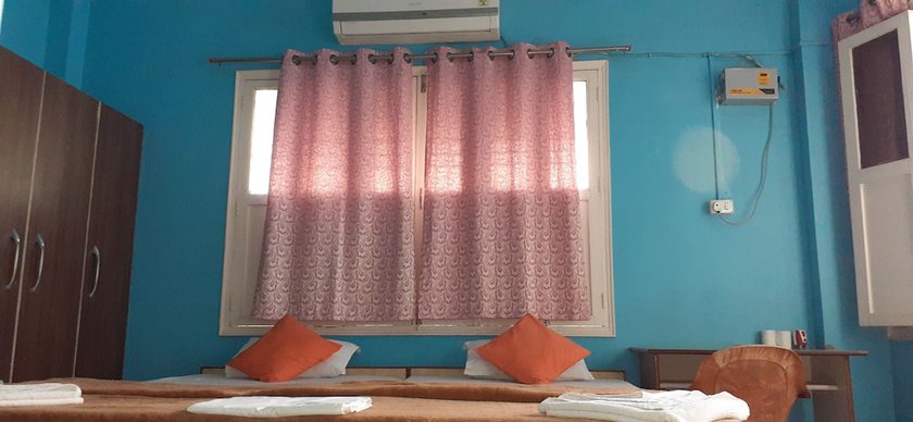 Imagen de la habitación del Hotel Shri Yoga Mandir Guest House. Foto 7