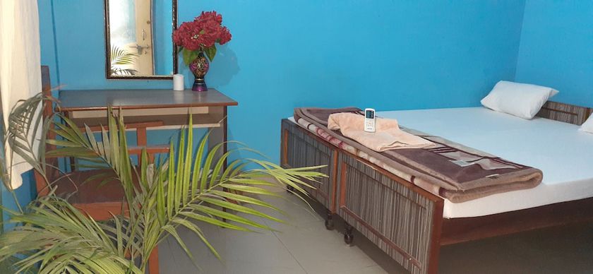 Imagen de la habitación del Hotel Shri Yoga Mandir Guest House. Foto 9