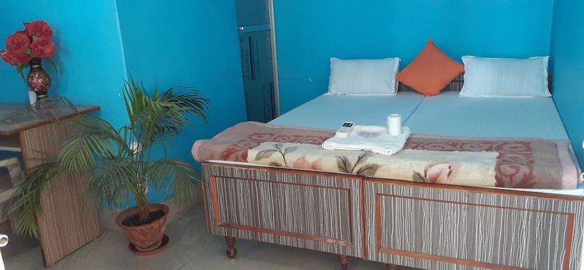 Imagen de la habitación del Hotel Shri Yoga Mandir Guest House. Foto 10