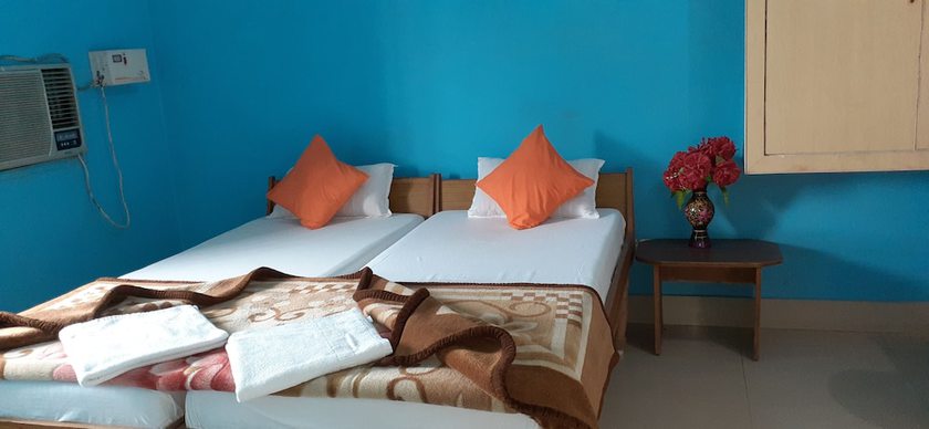 Imagen de la habitación del Hotel Shri Yoga Mandir Guest House. Foto 11