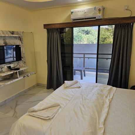 Imagen de la habitación del Hotel Shrikar Resort. Foto 10