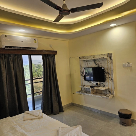 Imagen de la habitación del Hotel Shrikar Resort. Foto 11