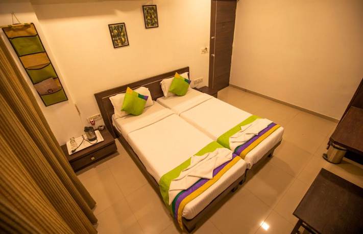 Imagen de la habitación del Hotel Shrimad Residency. Foto 6