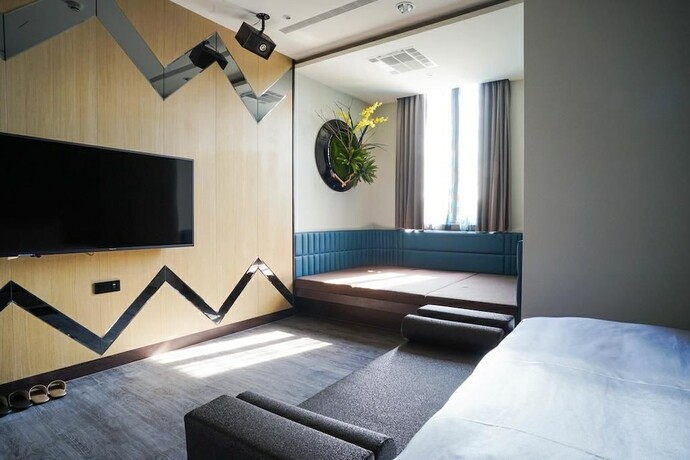 Imagen de la habitación del Hotel Shu Lan Motel. Foto 15