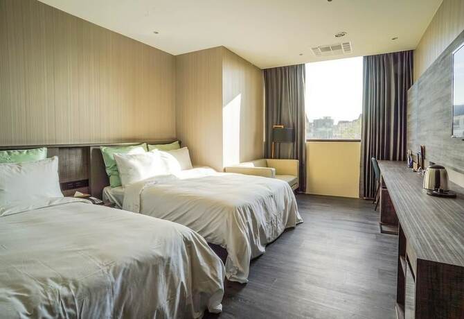 Imagen de la habitación del Hotel Shu Lan Motel. Foto 17