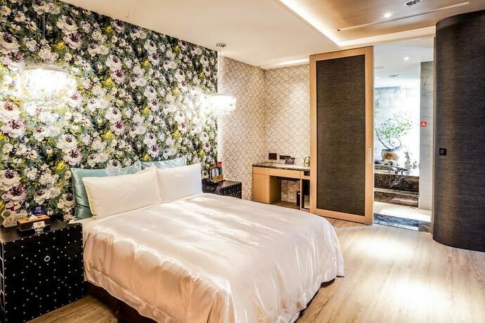 Imagen de la habitación del Hotel Shu Lan Motel. Foto 19