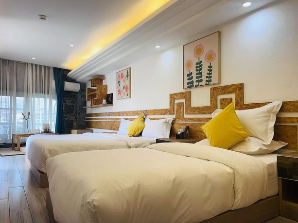 Imagen de la habitación del Hotel Shuanglang 7 Fun sea. Foto 5