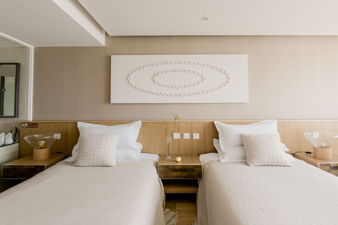 Imagen de la habitación del Hotel Shuanglang 7 Fun sea. Foto 11