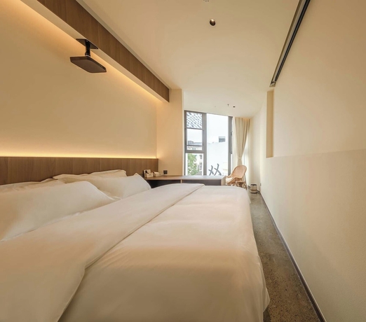 Imagen de la habitación del Hotel Shuangta Market TTD Tangtangdi. Foto 12